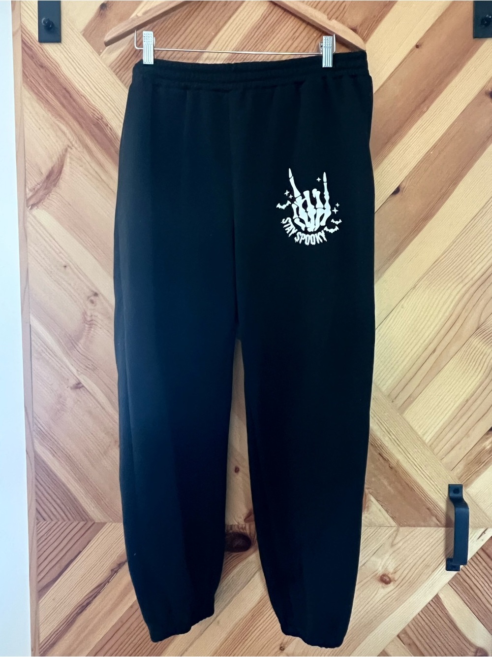 SHEIN Black Sweatpants with White Skeleton Hand Graphic